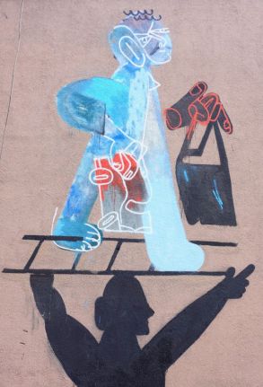 Czajkowski ZBK Sławeki | Mural na budynku dawnej strażnicy granicznej przy moście Przyjaźni , dobrze widoczny z drogi biegnącej wzdłuż Olzy patrząc od Hali MOSiR - lodowisko | Fot. Daria Konior